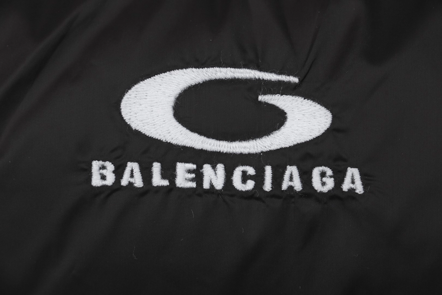 Balenciaga-Small-Oval-Logo-Puffer-Jacket-Black1.jpeg.webp Blcg Small Oval Logo Puffer Jacket Black