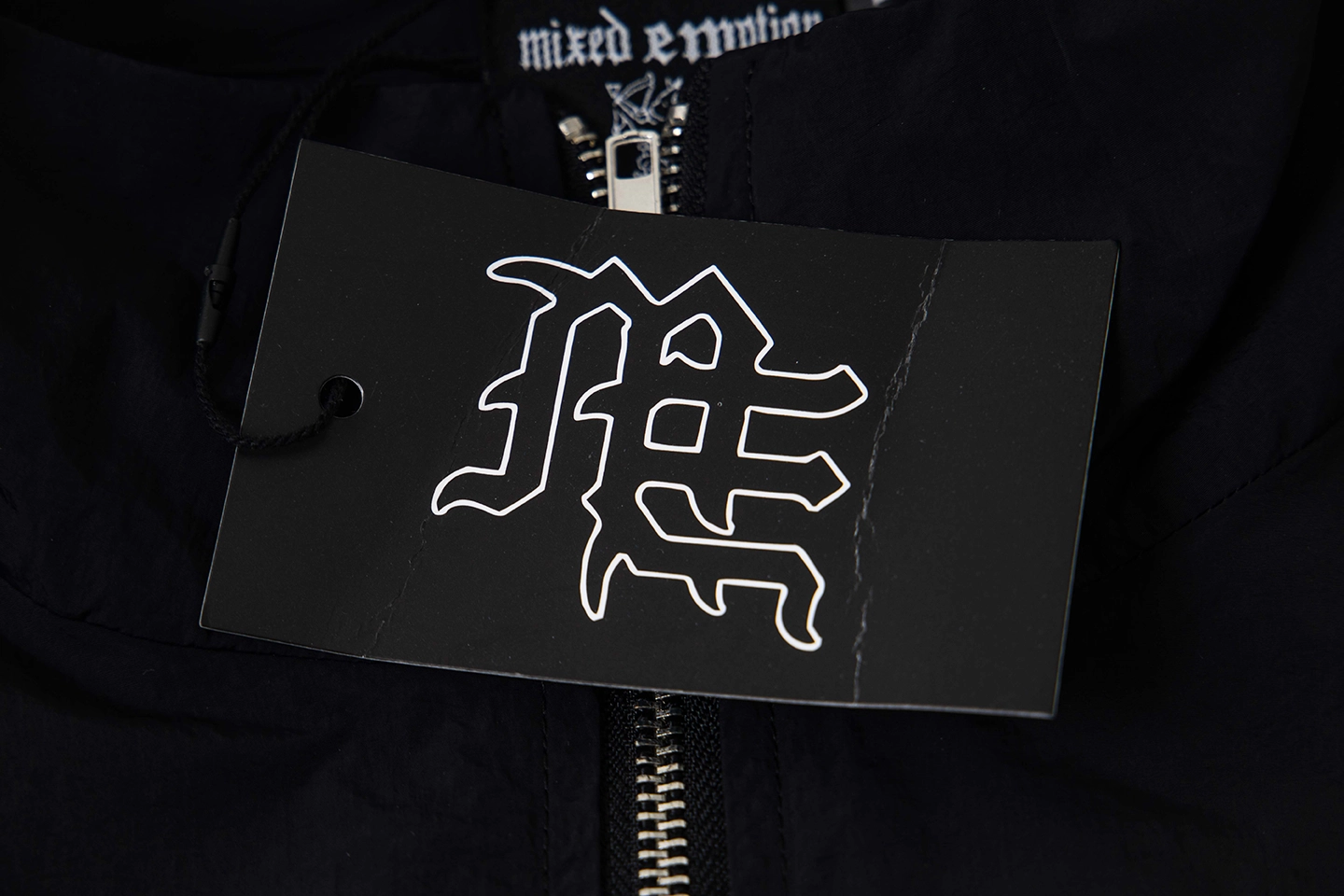 Mixed Emotion Rhinestone Logo Track Black Jacket