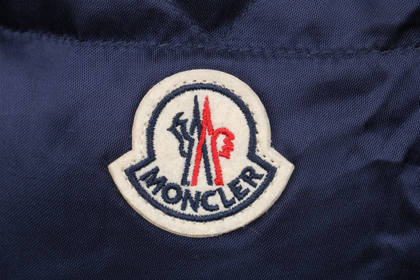 Mxxcler-Navy-Logo-Down-Jacket1.jpeg.webp Mxxcler Navy Logo Down Jacket