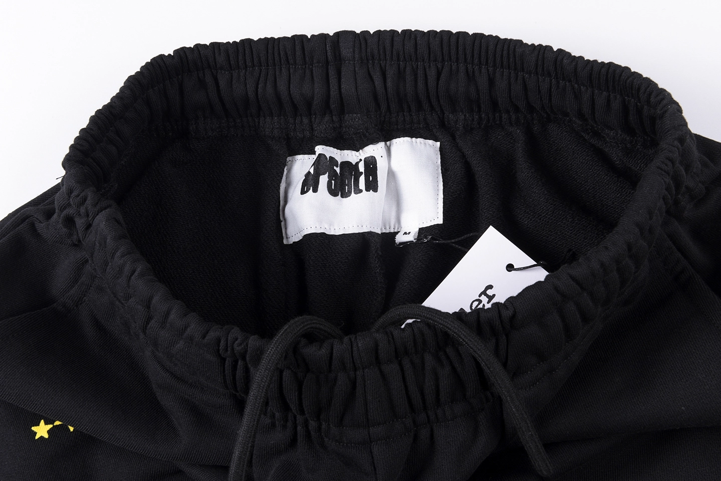 Sp5Der Black Flame Logo Graphic Sweatpants