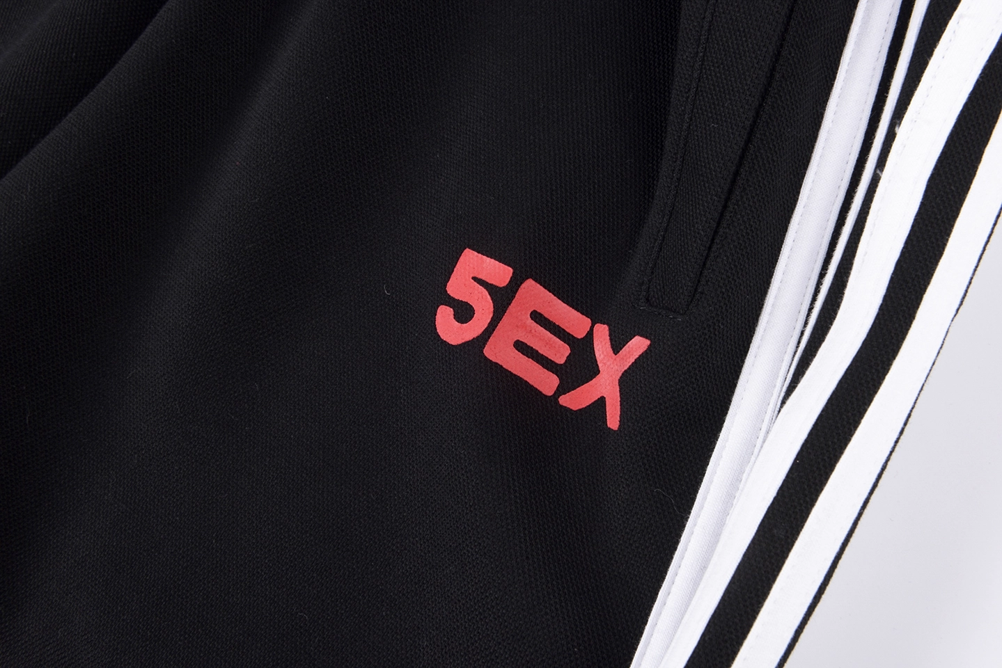 Sp5Der Black White Stripe Red Logo Track Pants