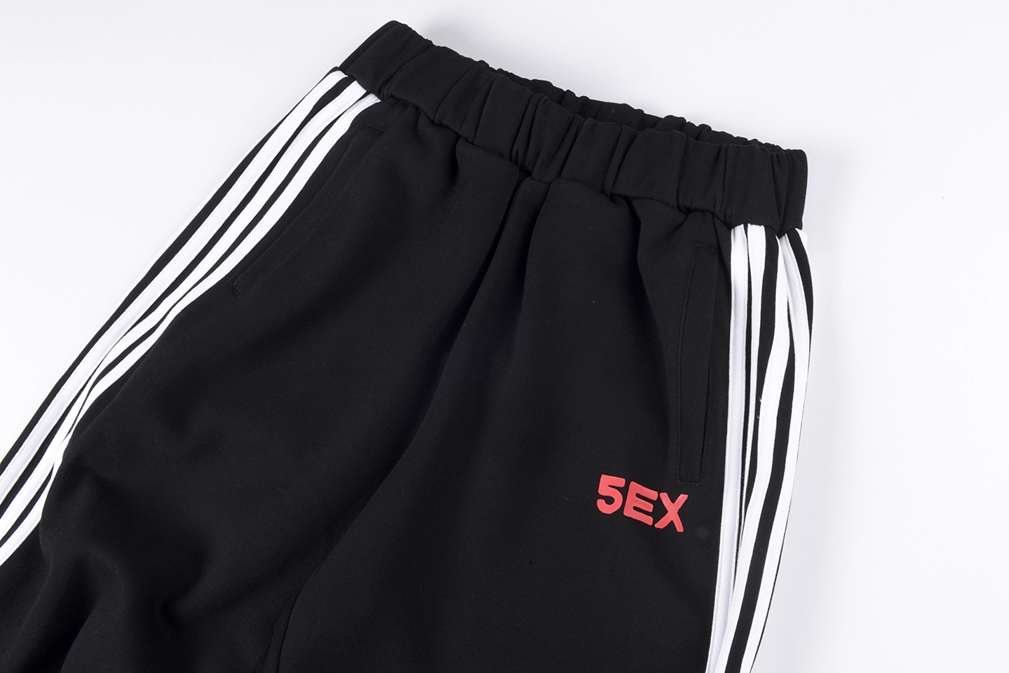 Sp5Der Black White Stripe Red Logo Track Pants