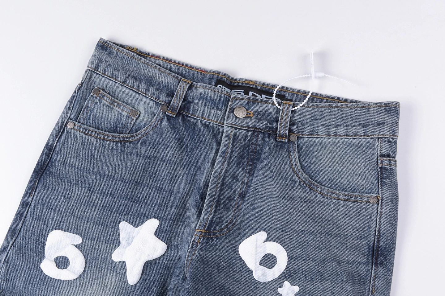 Sp5Der Blue White Star Graphic Denim Jeans