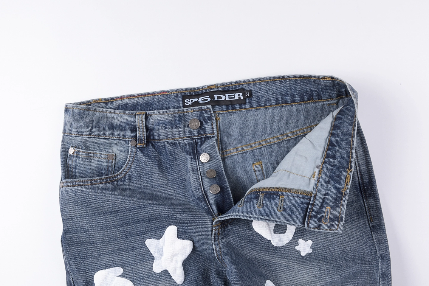 Sp5Der Blue White Star Graphic Denim Jeans