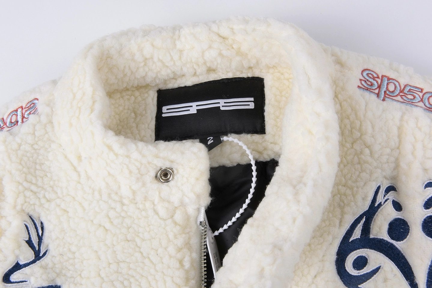 Sp5der-Ivory-Navy-Hunter-Sherpa-Jacket7.webp Sp5Der Ivory Navy Hunter Sherpa Jacket