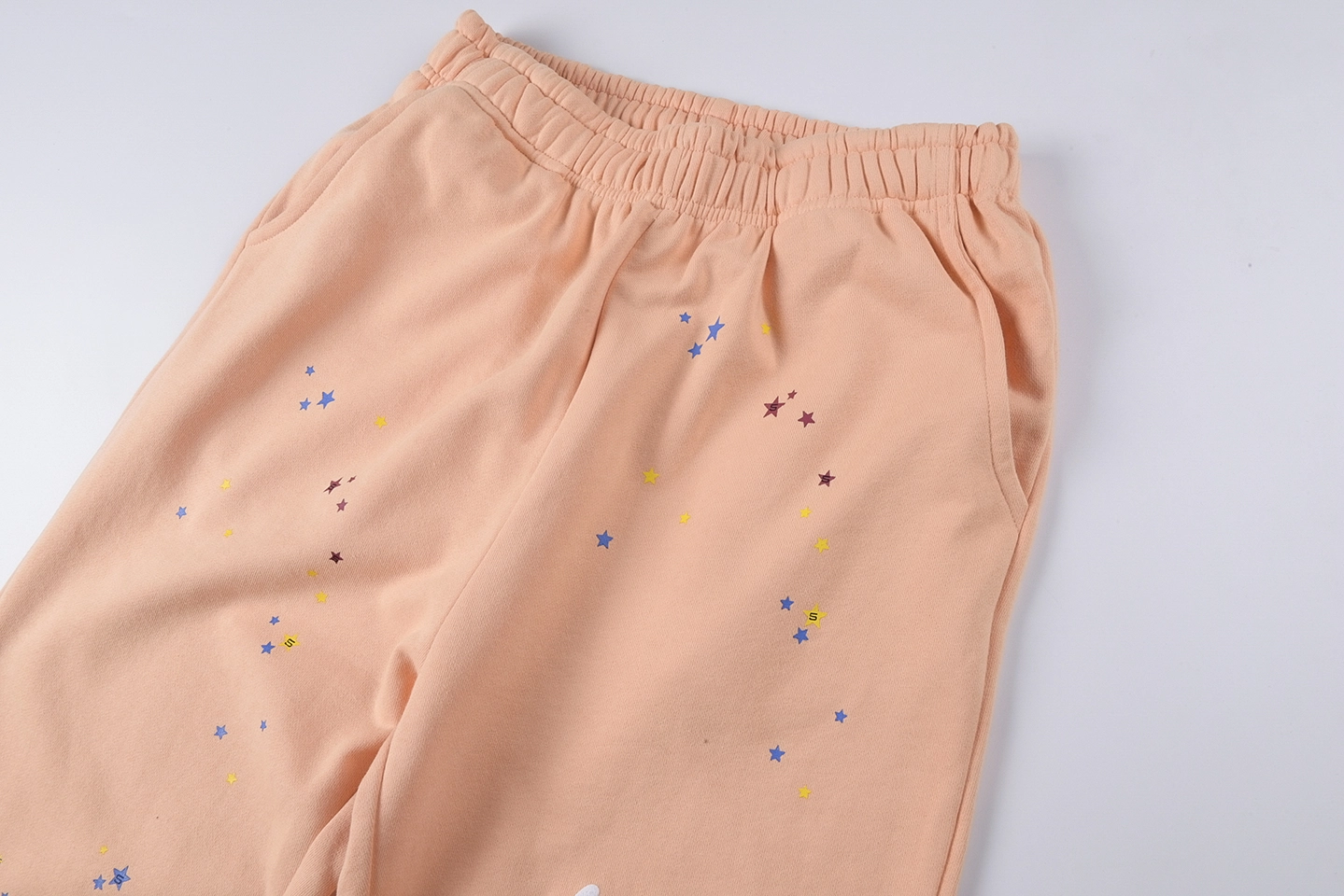 Sp5der-Peach-Star-Logo-Graphic-Sweatpants6.webp Sp5Der Peach Star Logo Graphic Sweatpants