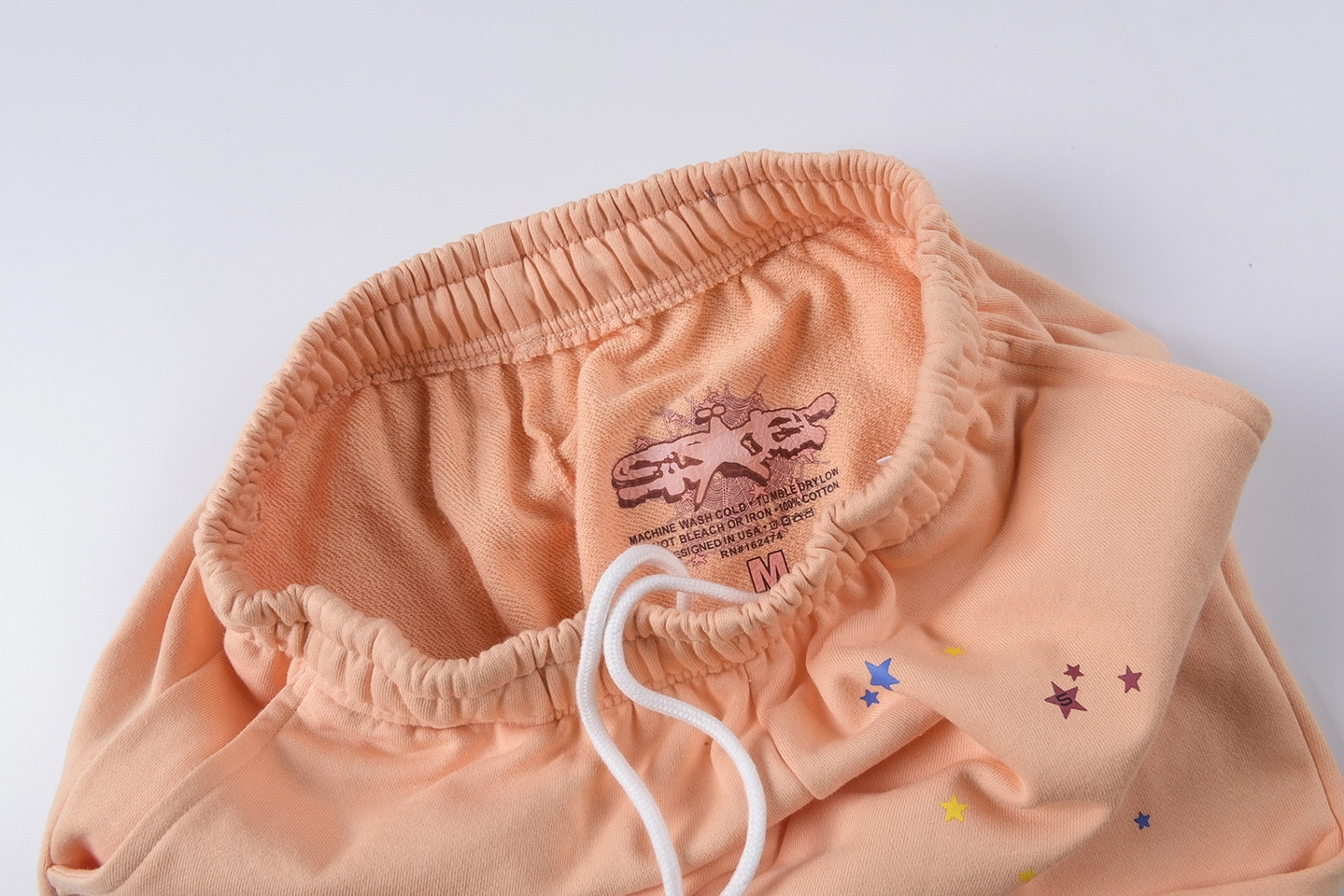 Sp5der-Peach-Star-Logo-Graphic-Sweatpants9.webp Sp5Der Peach Star Logo Graphic Sweatpants