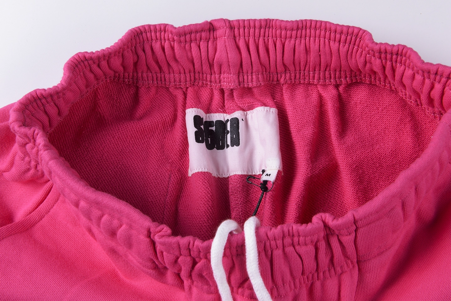 Sp5der-Pink-Rhinestone-Logo-Sweatpants4-1.webp Sp5Der Pink Rhinestone Logo Sweatpants