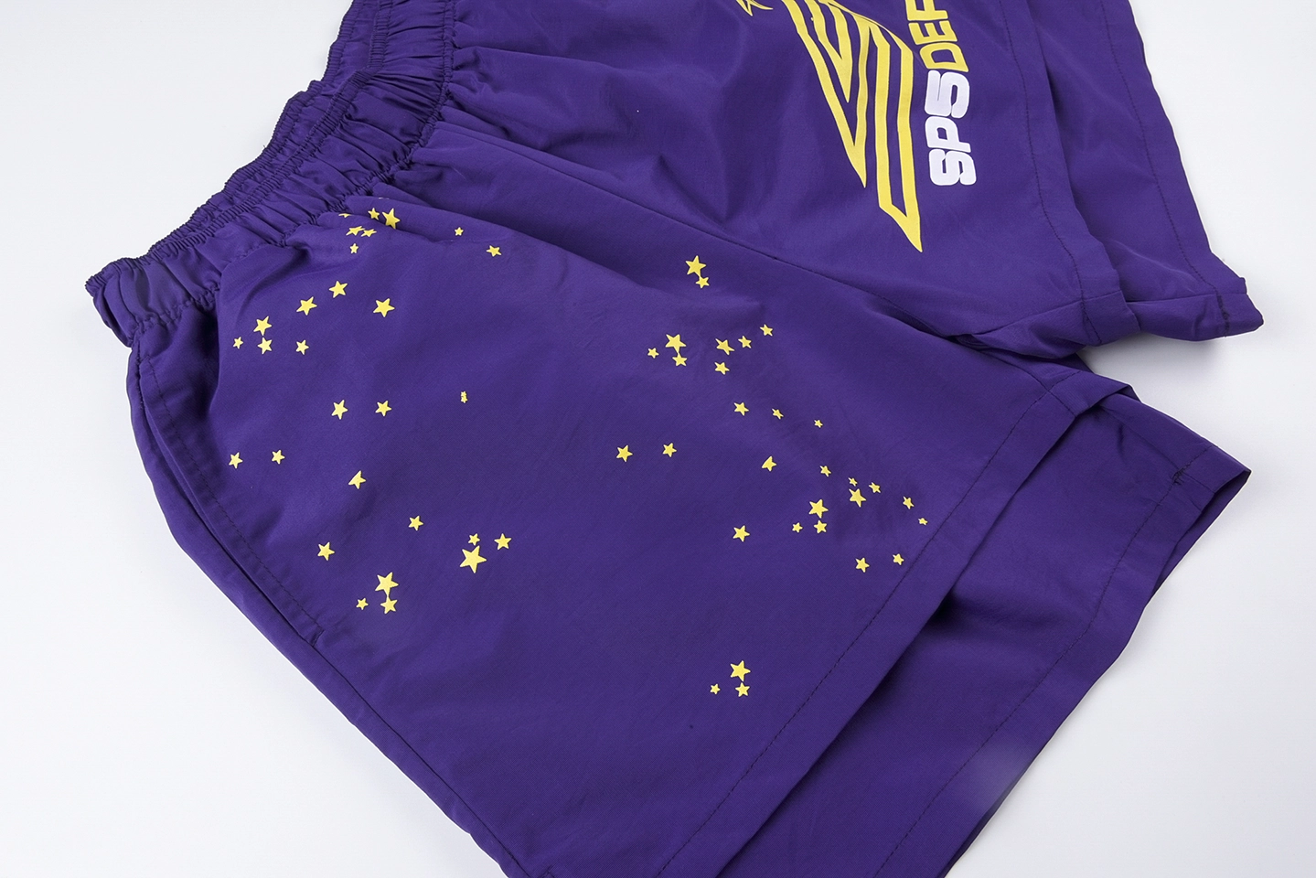 Sp5der-Purple-Star-Logo-Graphic-Shorts1.webp Sp5Der Purple Star Logo Graphic Shorts