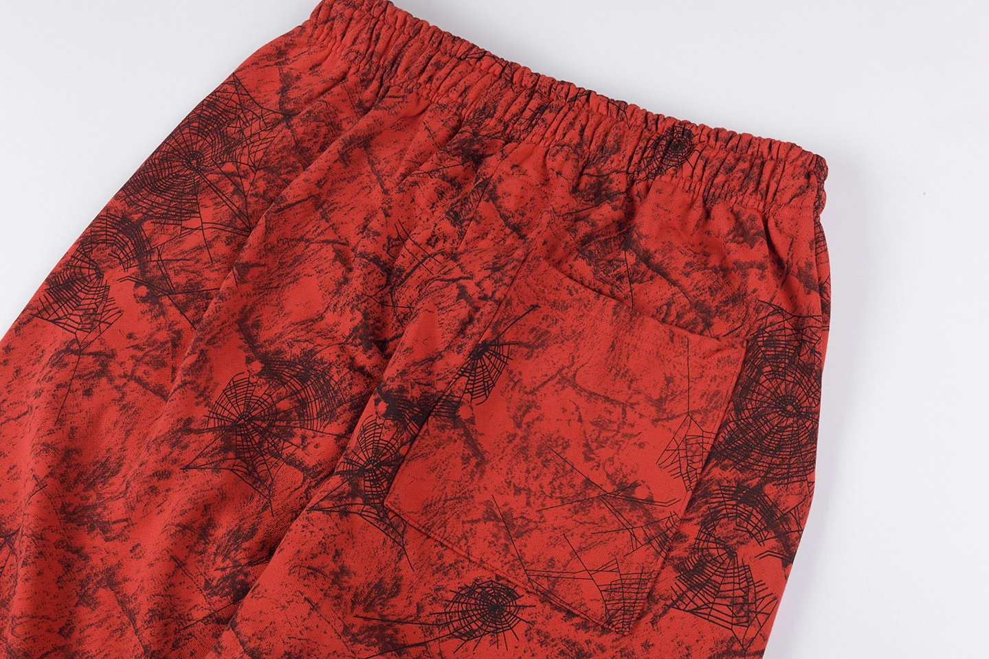 Sp5Der Red Web Print Sweatpants