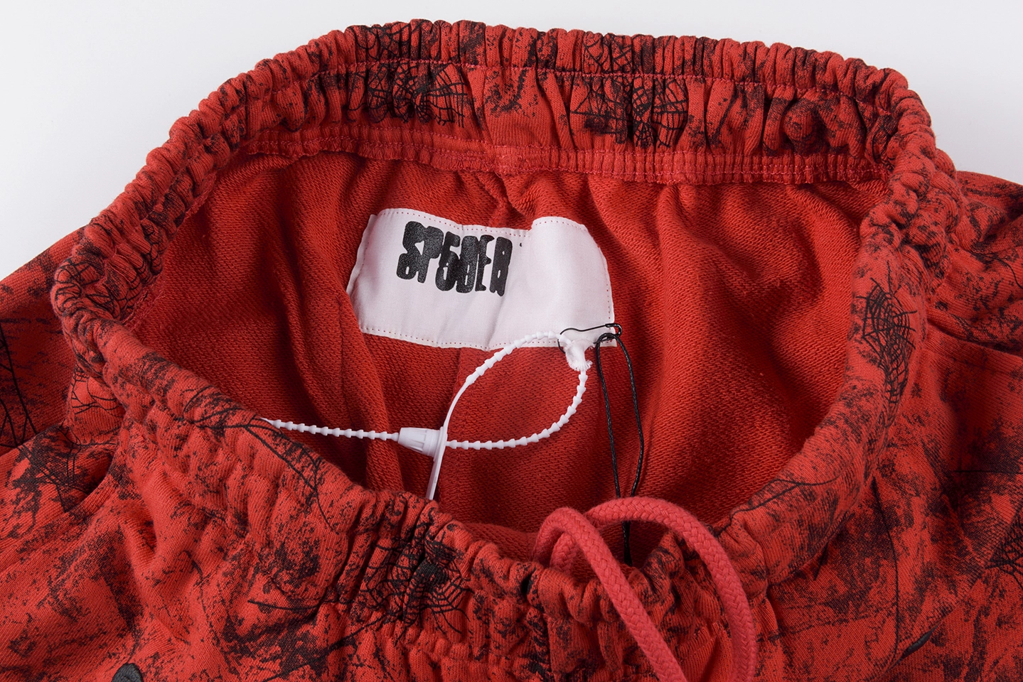 Sp5Der Red Web Print Sweatpants