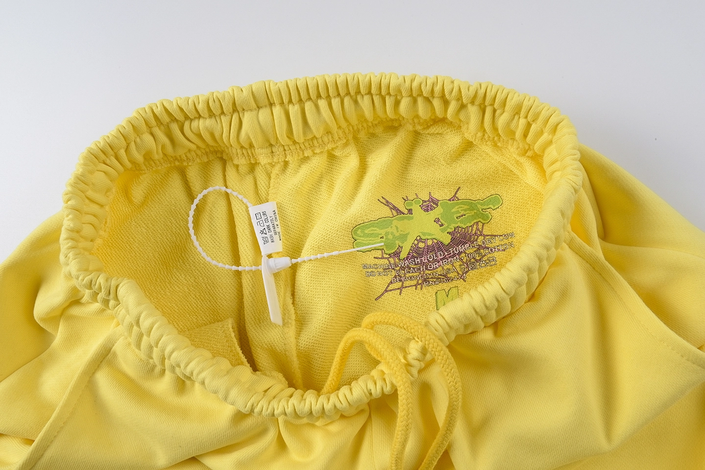 Sp5Der Rhinestone World Yellow Sweatpants