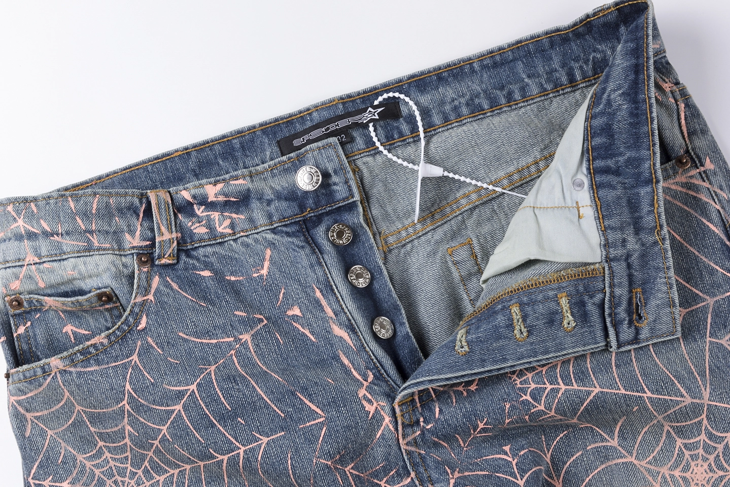 Sp5Der Washed Denim Pink Web Jeans