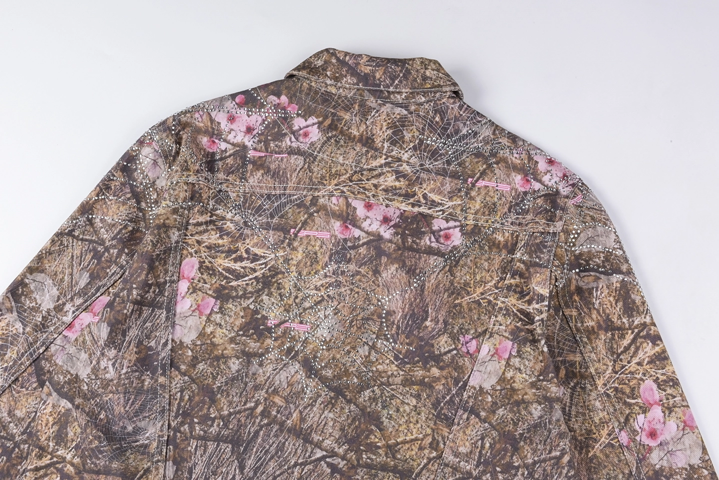 Sp5der-Woodland-Blossom-Camo-Trucker-Jacket2.webp Sp5Der Woodland Blossom Camo Trucker Jacket