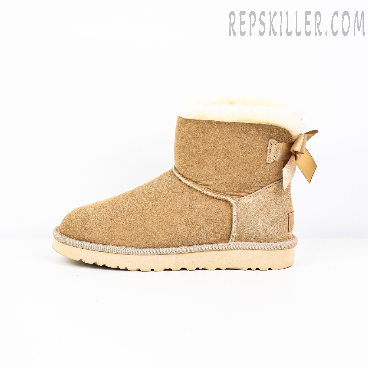 Wmns Mini Bailey Bow Ii Sand Beige