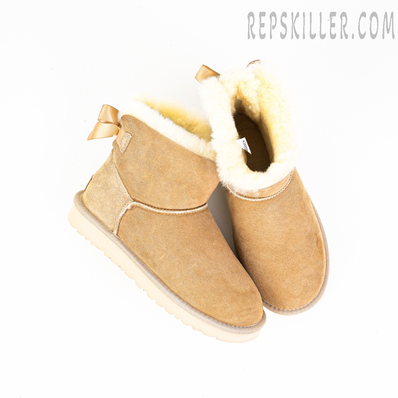Wmns Mini Bailey Bow Ii Sand Beige